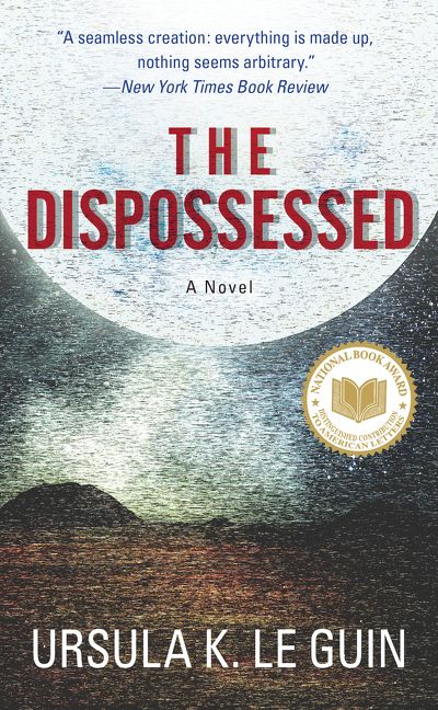 The cover of a recent edition of The Dispossessed by Ursula K. Le Guin. A large white moon fills the top of the image, with a plain brown landscape below.