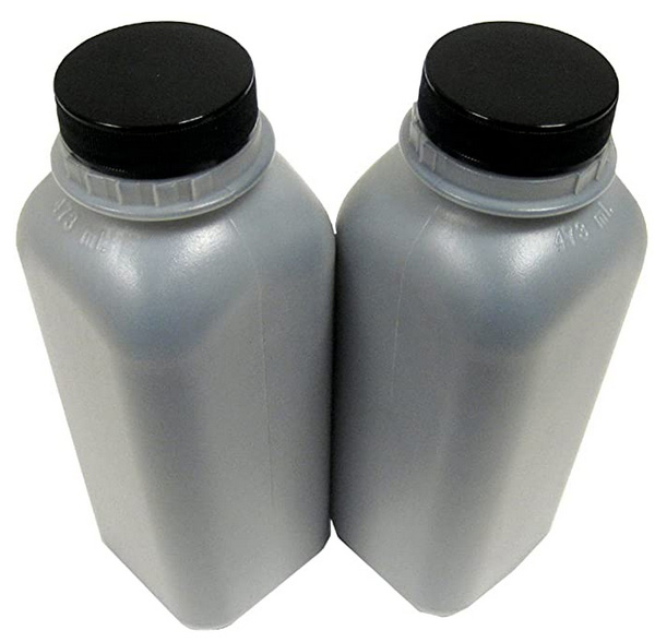 Two plastic bottles with black lids, full of black printer toner