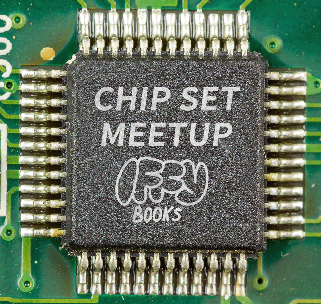 Photo of a microchip soldered to a green circuit board, with the text "CHIP SET MEETUP" and the Iffy Books logo on the chip.