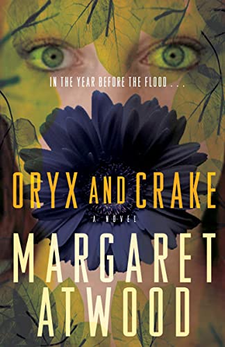 The cover of 'Oryx and Crake' by Margaret Atwood, with a photo illustration of a dark blue flower covering a woman's mouth and nose.