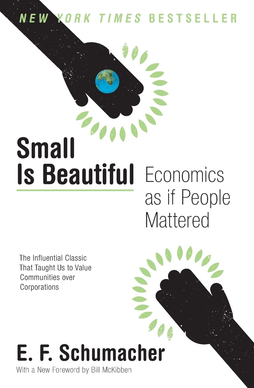 Cover of the current edition of Small Is Beautiful: Economics as if People Mattered by E. F. Schumacher, with an illustration of two hands, black on a white background, one holding the Earth
