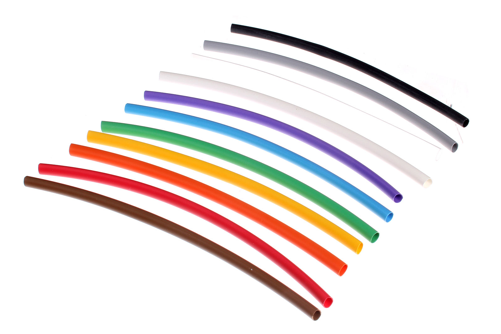 Heat shrink tubing lined up to form a rainbow: brown, red, orange, yellow, green, blue, purple, light gray, white, dark gray, black