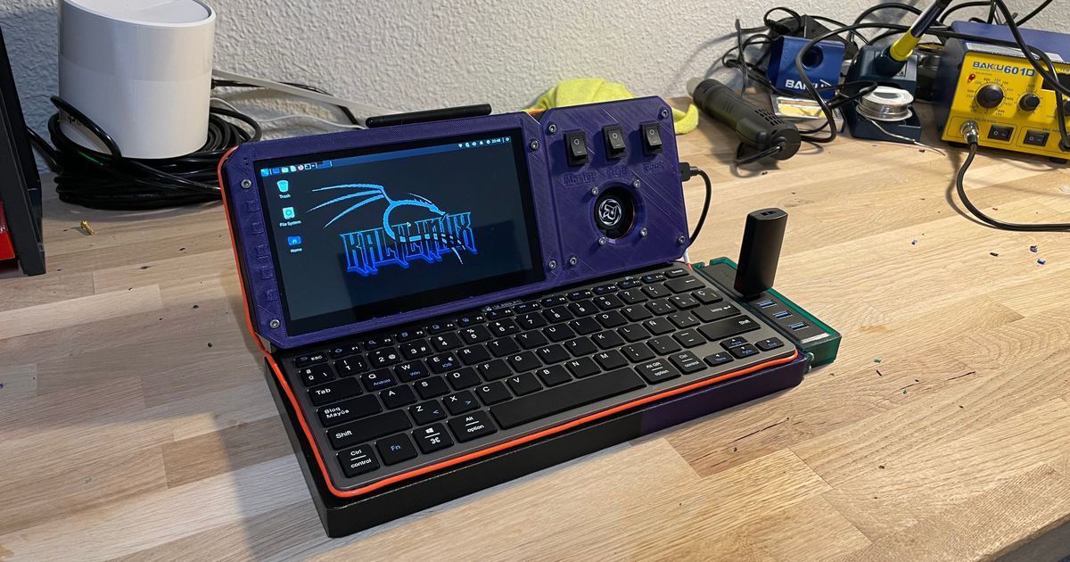 Photo of a cyberdeck, i.e. a DIY laptop with a tiny screen. This one is running Kali Linux.